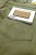 Wrangler Greensboro Regular Straight  Olive spodnie materiałowe oliwkowe - zbliżenie na tylną kieszeń