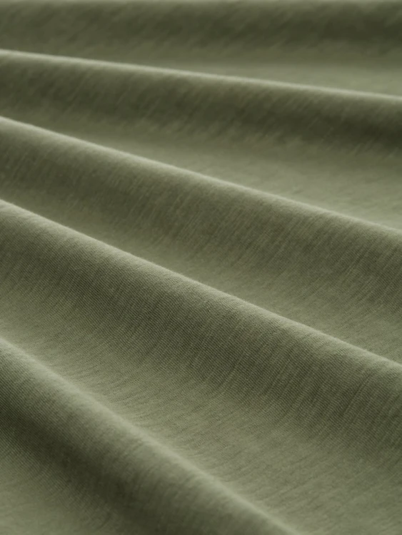 Koszulka z długim rękawem męska zielona Tom Tailor Long-sleeved cotton Henley - zbliżenie na materiał